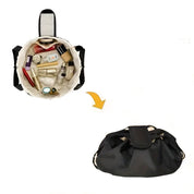 Borsa cosmetica nera aperta e chiusa, organizer da viaggio, contenitore per trucchi, accessori beauty, design compatto e portatile.