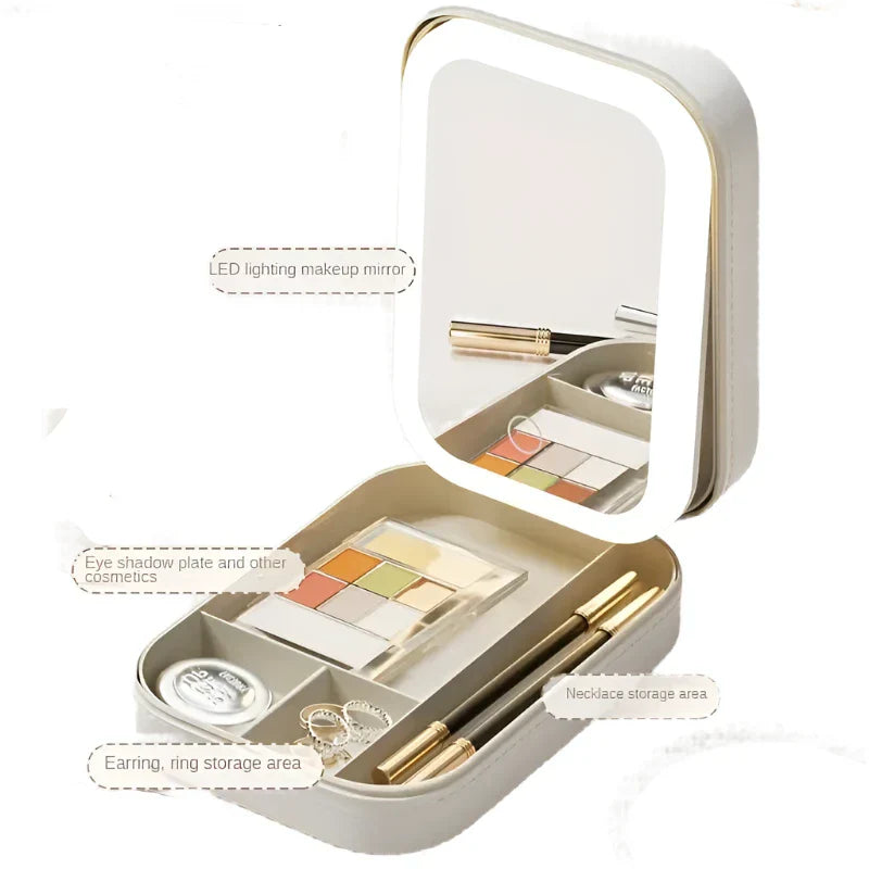 Specchio trucco portatile con luci LED, scomparti per ombretti, gioielli e cosmetici. Design compatto, ideale per viaggi e organizzazione.