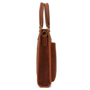 Borsa in pelle marrone, vista laterale, design elegante e minimalista, manici robusti, ideale per lavoro e uso quotidiano. Accessorio moda di qualità.