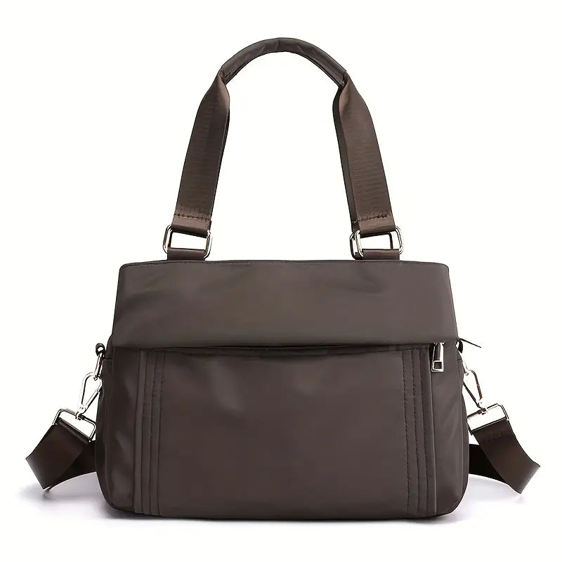 Borsa a tracolla marrone in pelle sintetica, design elegante con cerniera, manici regolabili, ideale per donna, moda autunno inverno.