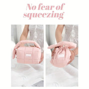 Borsa rosa pieghevole in tessuto morbido, resistente alla compressione, con manico imbottito. Ideale per viaggi e organizzazione.