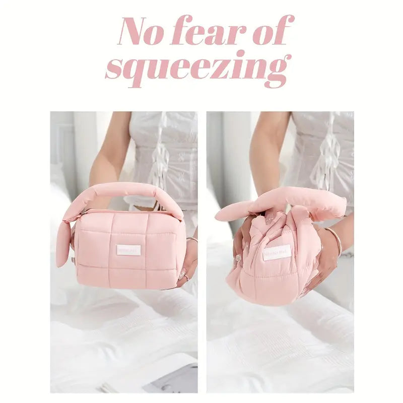 Borsa rosa pieghevole in tessuto morbido, resistente alla compressione, con manico imbottito. Ideale per viaggi e organizzazione.