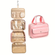 Borsa da viaggio rosa con gancio, scomparti trasparenti e tasche multiple, ideale per cosmetici e accessori. Design compatto e funzionale.