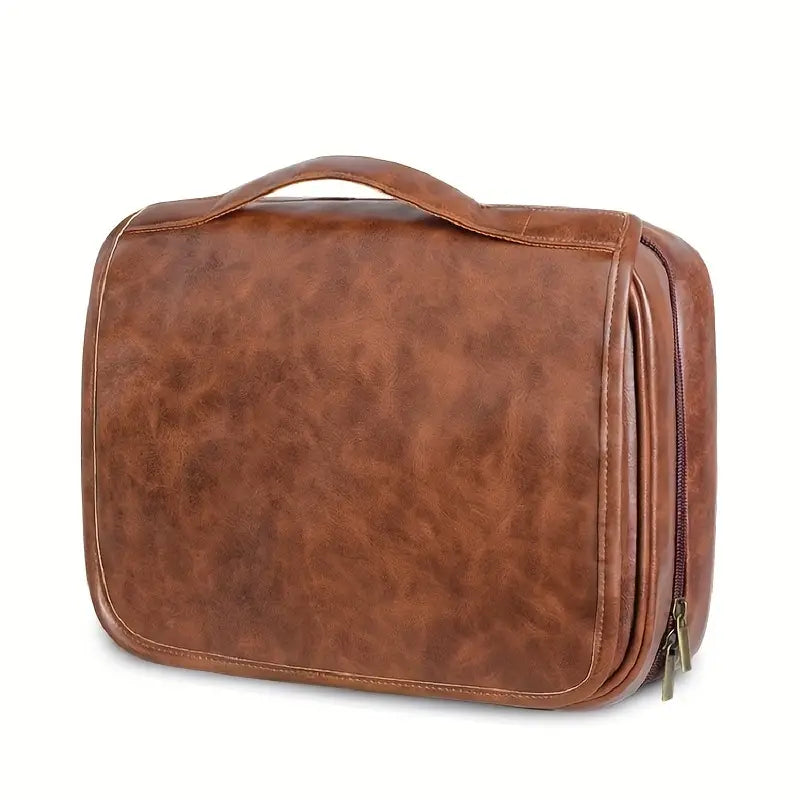 Borsa da viaggio in pelle marrone con manico, design elegante e spazioso, ideale per organizzare accessori e articoli da toeletta.