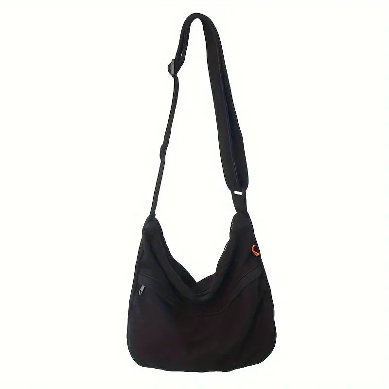 Borsa a tracolla nera unisex, design moderno, con tasche multiple e cerniera, ideale per uso quotidiano e viaggi. Accessorio moda versatile.