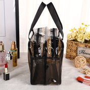 Borsa trasparente in PVC con doppia cerniera, manici neri, ideale per cosmetici. Design elegante, perfetta per viaggi e organizzazione.