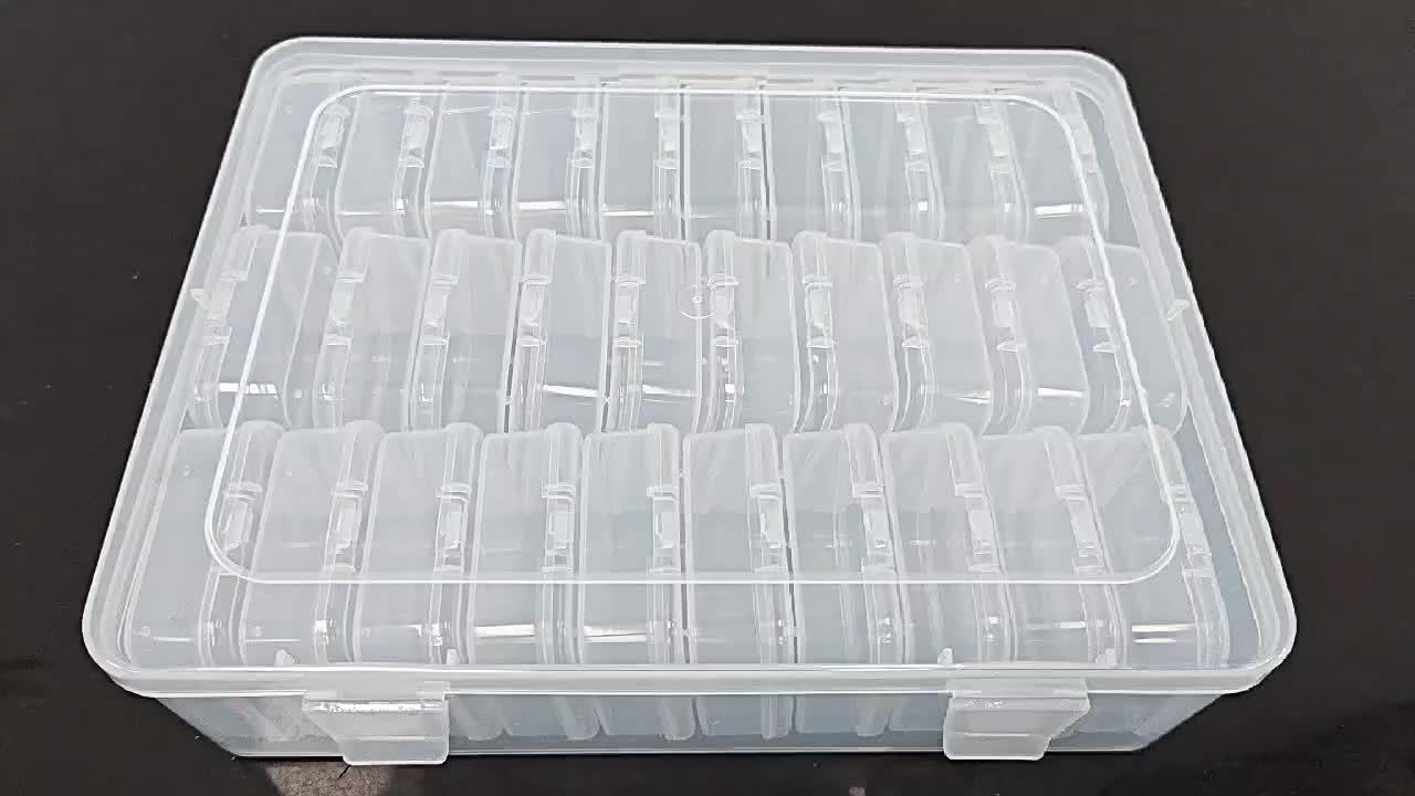 Scatola organizer trasparente in plastica con scomparti regolabili, ideale per conservare piccoli oggetti, accessori artigianali o minuteria.