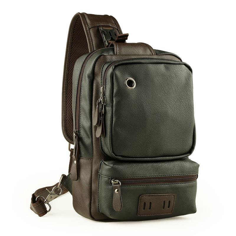 Zaino a tracolla in pelle marrone scuro con tasche multiple e cerniere, design elegante e funzionale, ideale per viaggi e uso quotidiano.