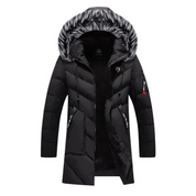 Giacca invernale nera con cappuccio in pelliccia sintetica, design trapuntato, chiusura a zip, tasche laterali, ideale per climi freddi.