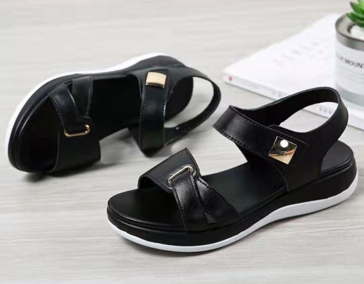 Sandali neri da donna con cinturino regolabile, suola bianca antiscivolo, design elegante e moderno, ideali per l'estate e il tempo libero.