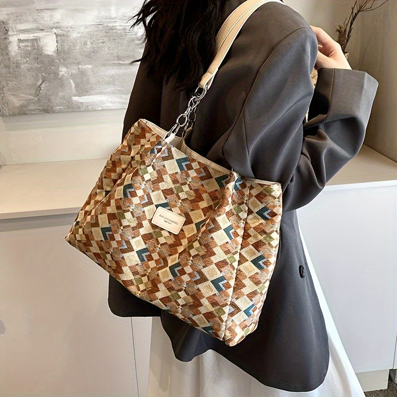Borsa a tracolla donna in tessuto geometrico multicolore, design moderno, manico in pelle, ideale per moda casual e shopping.