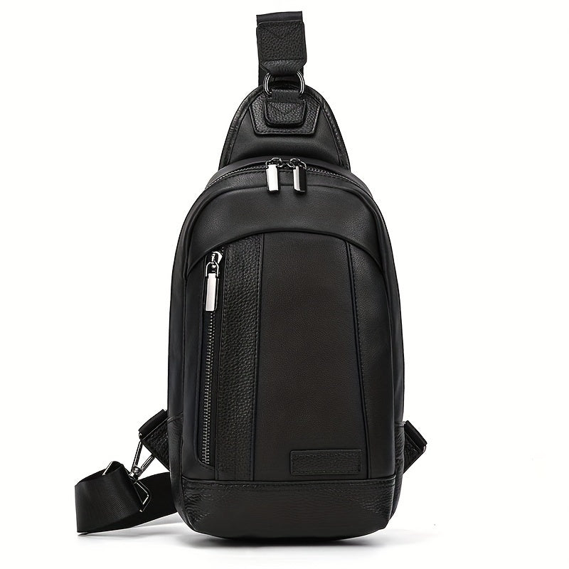 Zaino monospalla in pelle nera, design moderno con cerniere argentate, tasca frontale, ideale per uomo, perfetto per viaggi e uso quotidiano.