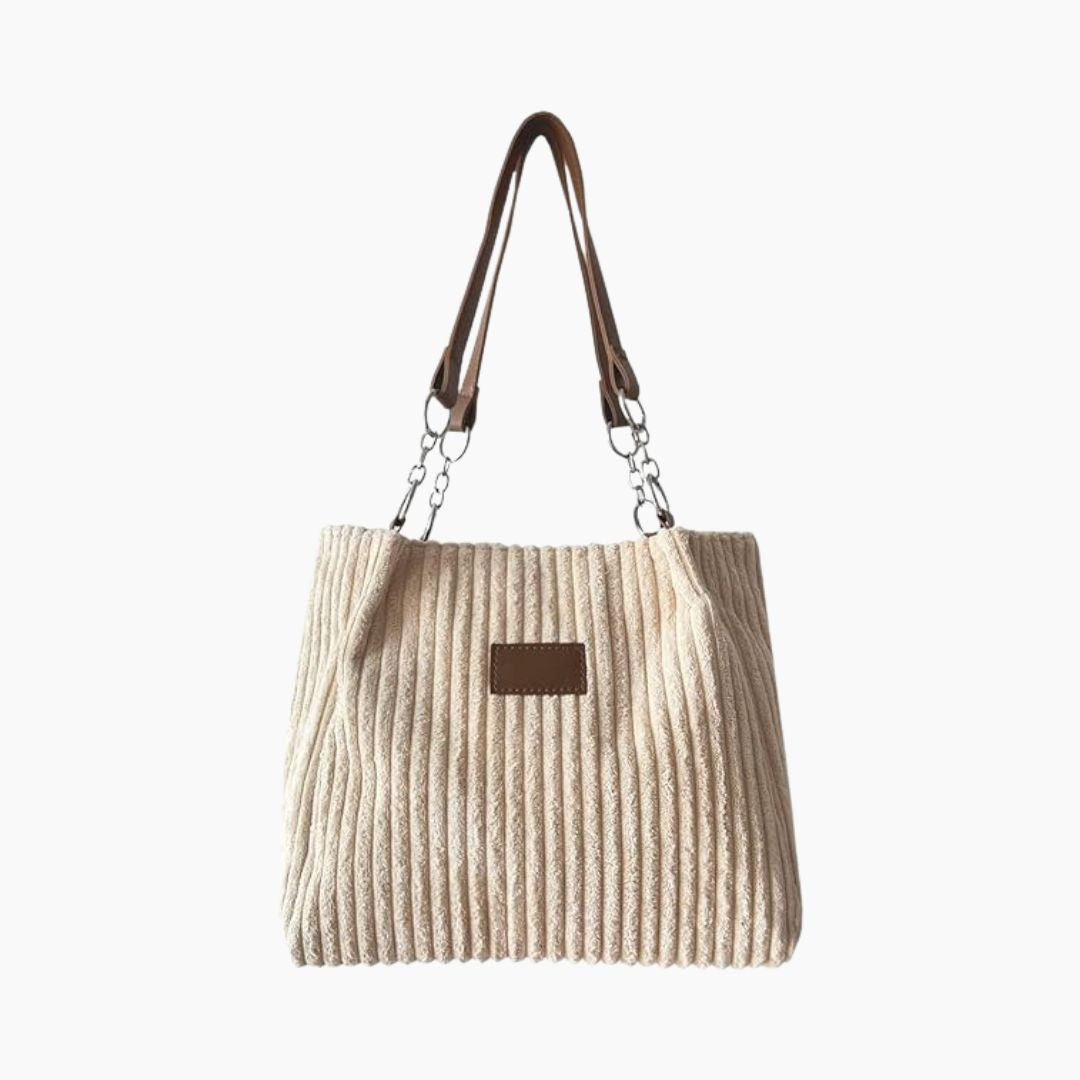 Borsa a spalla in tessuto a coste beige con manici in pelle marrone, design elegante e casual, perfetta per moda donna e accessori quotidiani.