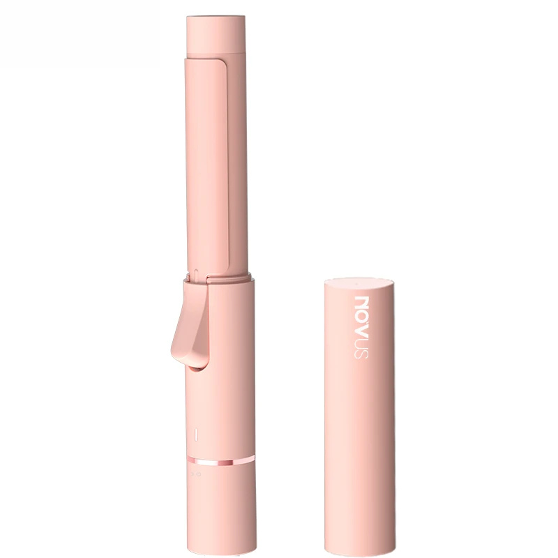 Piastra per capelli rosa Novus, design compatto e portatile, ideale per styling veloce e preciso. Accessorio capelli essenziale per look perfetti.