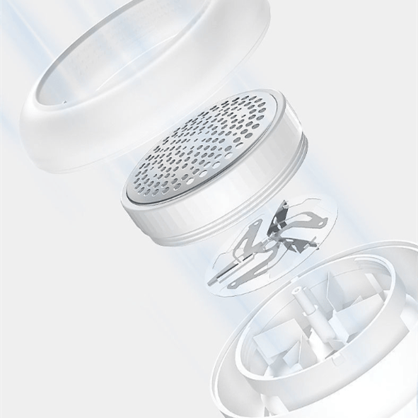 Esploso di un dispositivo elettrico per la rimozione dei pelucchi, con lame in acciaio inox e griglia protettiva, design moderno e compatto.