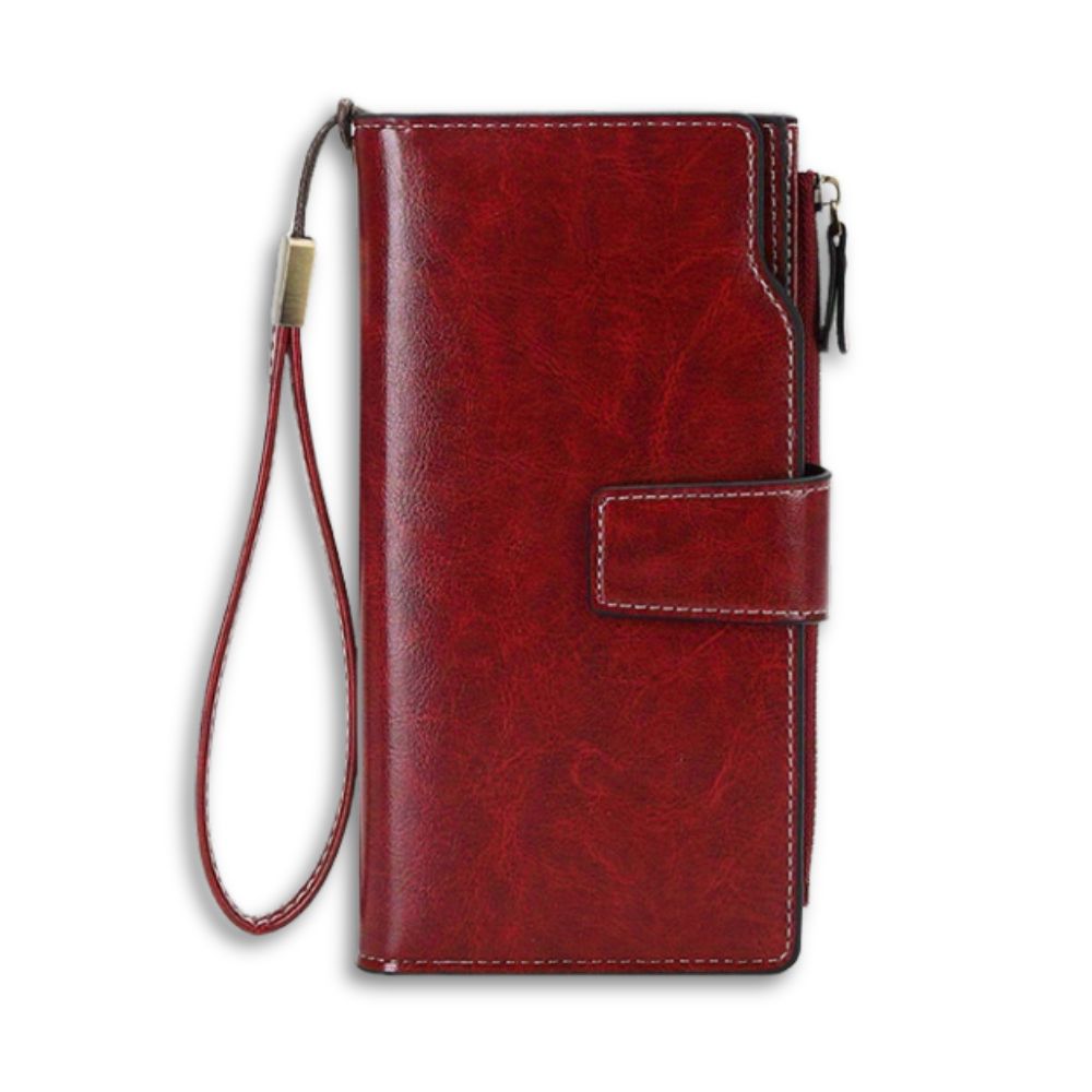 Portafoglio donna in pelle rossa con cinturino, chiusura a bottone, design elegante, ideale per carte e contanti. Accessorio moda di alta qualità.