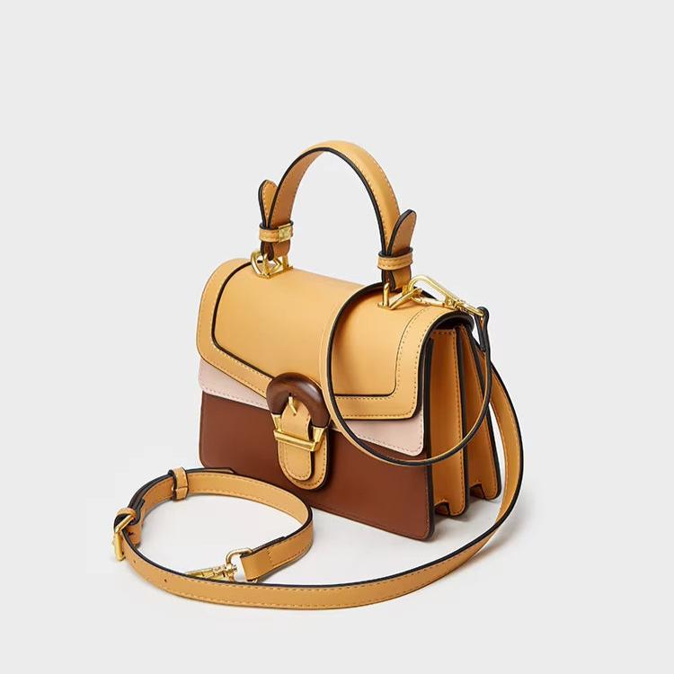 Borsa a tracolla in pelle multicolore, design elegante con manico superiore e chiusura a fibbia dorata. Accessorio moda donna, stile moderno.