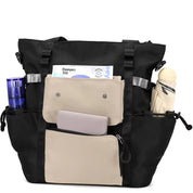Borsa tote nera multifunzione con tasche esterne, contenente ombrello, bottiglia d'acqua e accessori. Ideale per viaggi e uso quotidiano.
