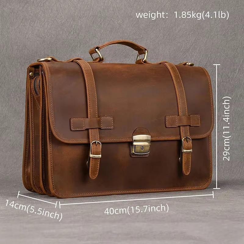 Borsa a tracolla in pelle marrone, dimensioni 40x29x14 cm, peso 1,85 kg. Design elegante con fibbie e manico, ideale per lavoro e viaggi.