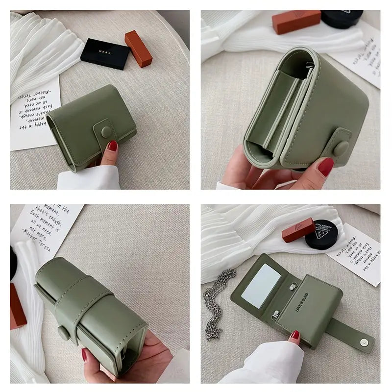 Portafoglio donna verde salvia in pelle sintetica, compatto e pieghevole, con scomparti per carte e monete. Accessorio moda elegante e pratico.
