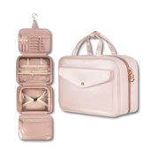 Borsa da viaggio rosa con gancio, scomparti multipli, tasche trasparenti, ideale per cosmetici e accessori. Design elegante e funzionale.