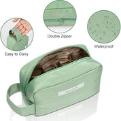 Borsa trucco verde impermeabile con doppia cerniera, manico per trasporto facile, ideale per cosmetici e accessori da viaggio.