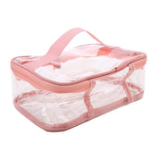 Borsa trasparente in PVC rosa con manico, ideale per viaggi e organizzazione cosmetici. Design resistente e impermeabile.