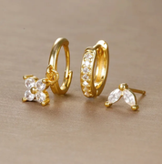 Orecchini in oro con zirconi, design floreale e cerchio, eleganti e raffinati, ideali per moda donna, accessori gioielli di lusso.