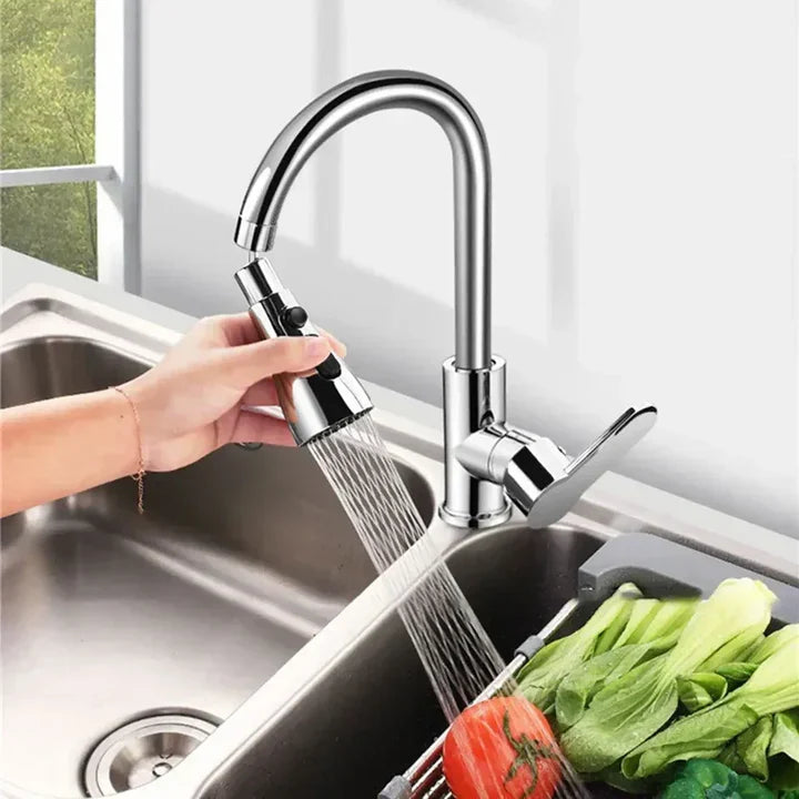 Rubinetto cucina in acciaio inox con doccetta estraibile, design moderno, flusso d'acqua regolabile, ideale per lavello e preparazione cibi.