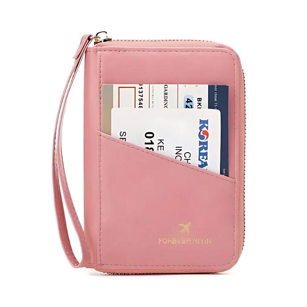 Portafoglio da viaggio rosa con cerniera, tasca esterna contenente biglietti aerei. Design elegante, ideale per organizzare documenti di viaggio.