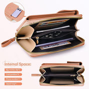 Portafoglio donna in pelle marrone con cerniera, scomparti per carte, tasca per telefono e clip per banconote. Design elegante e funzionale.