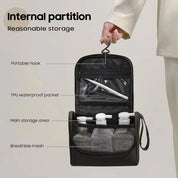 Borsa da viaggio nera con gancio portatile, tasca impermeabile in TPU, area di stoccaggio principale e rete traspirante. Ideale per organizzazione.