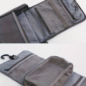 Borsa da viaggio grigia con gancio, scomparti a rete e cerniere. Organizer impermeabile per articoli da toeletta, ideale per viaggi e bagagli a mano.