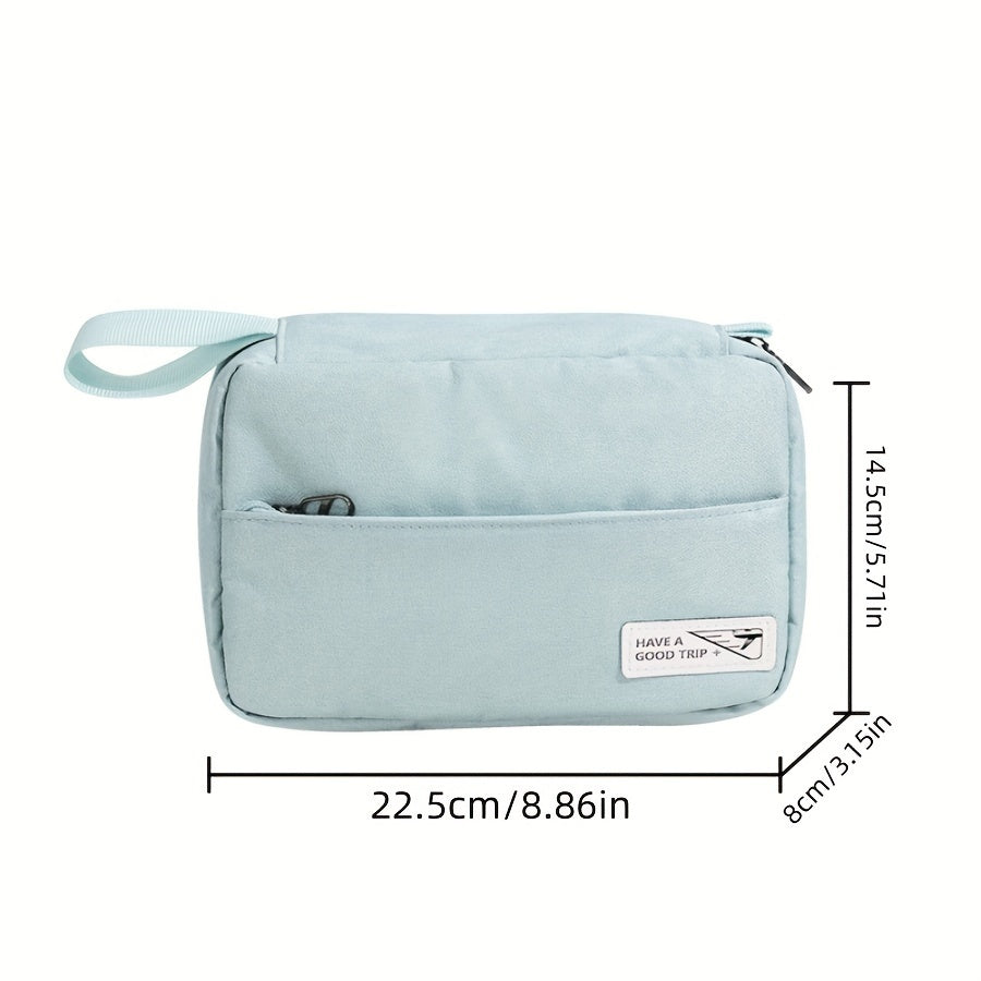 Borsa da toilette da viaggio azzurra, compatta e impermeabile, con cerniera e manico. Dimensioni: 22,5x14,5x8 cm. Ideale per organizzare accessori.