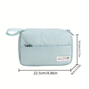 Borsa da toilette da viaggio azzurra, compatta e impermeabile, con cerniera e manico. Dimensioni: 22,5x14,5x8 cm. Ideale per organizzare accessori.