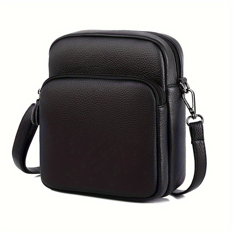 Borsa a tracolla in pelle nera da uomo, design elegante e compatto, con cerniera e tracolla regolabile. Accessorio moda maschile versatile.