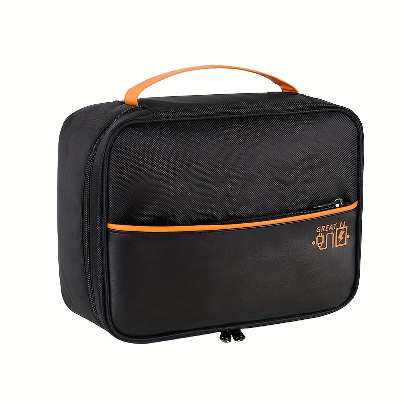 Borsa organizer nera con manico arancione, tasca frontale e cerniera. Ideale per viaggi, accessori elettronici e articoli da toeletta.