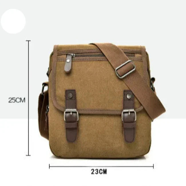Borsa a tracolla in tela marrone, dimensioni 23x25 cm, con fibbie in pelle e tasca frontale con zip. Ideale per uomo, stile casual e vintage.