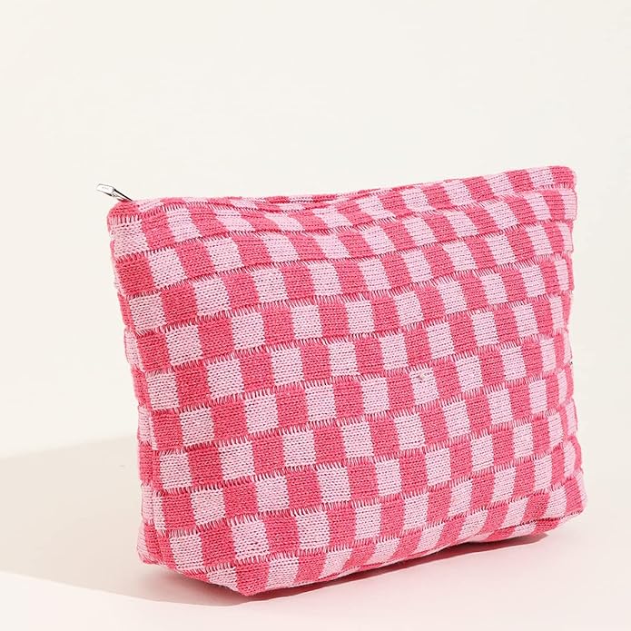 Borsa a quadri rosa e bianchi, tessuto intrecciato, chiusura con zip, accessorio moda donna, elegante e pratico per uso quotidiano.