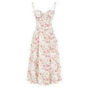Abito estivo donna floreale bianco e rosa, senza maniche, scollo a cuore, lunghezza midi, perfetto per occasioni casual e eleganti.