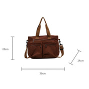 Borsa a tracolla marrone in tela, dimensioni 36x28x14 cm, con manici e tasche multiple con cerniera. Accessorio moda pratico e versatile.