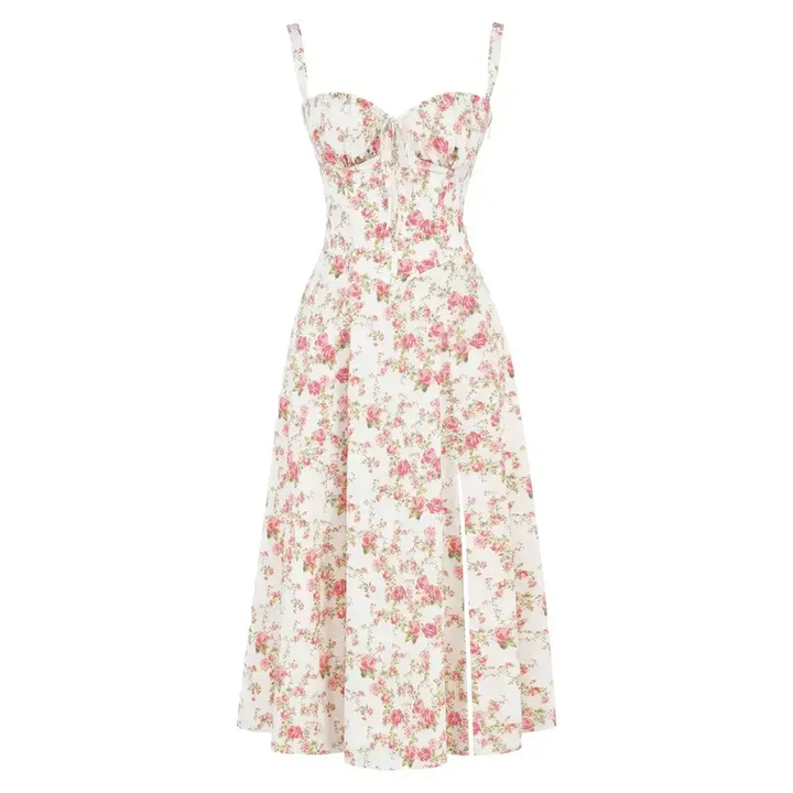 Abito estivo donna floreale bianco e rosa, senza maniche, scollo a cuore, lunghezza media. Perfetto per occasioni casual e eleganti.