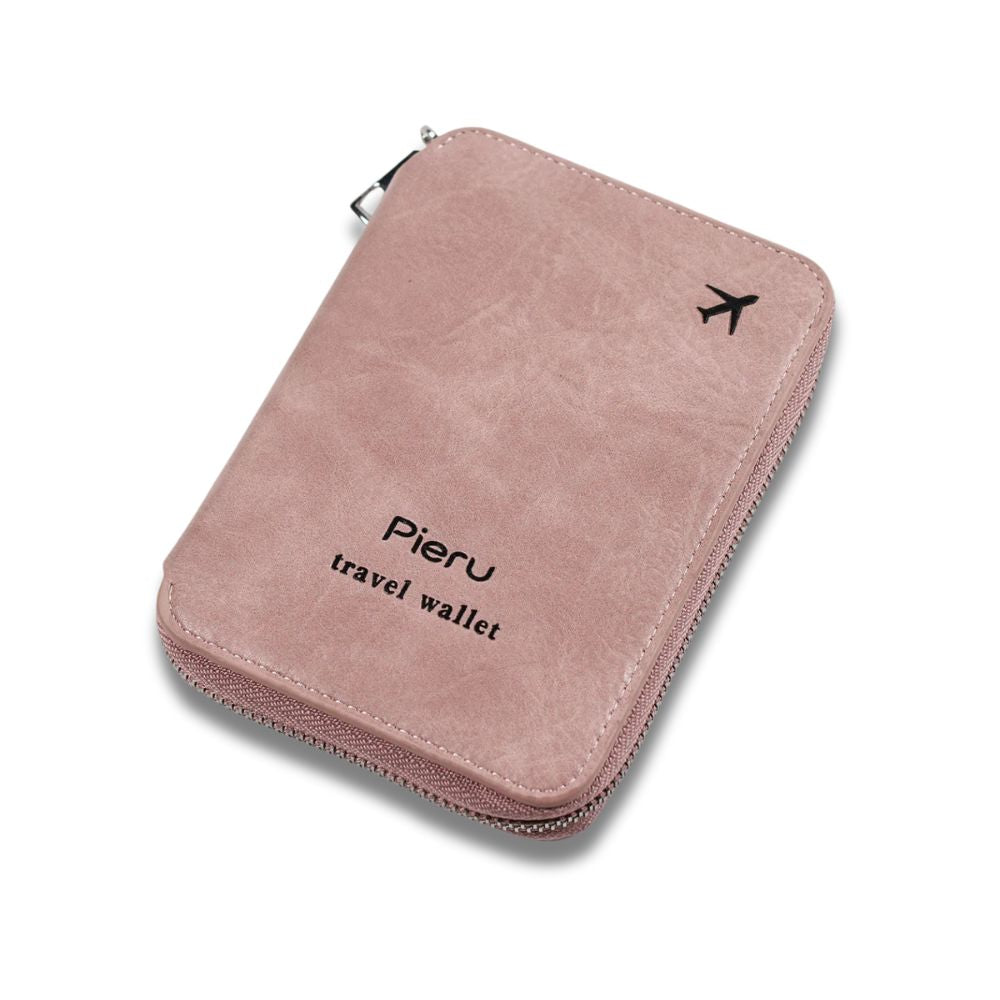 Portafoglio da viaggio rosa in pelle sintetica con cerniera, logo "Pieru" e icona aereo. Accessorio elegante per organizzare documenti e carte.