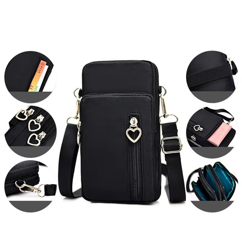 Borsa a tracolla nera multifunzione con cerniere a cuore, tasche multiple, scomparti per carte, design elegante e pratico per donna.