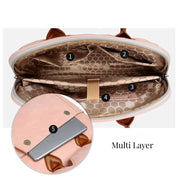 Borsa a tracolla rosa multi-scomparto, design a nido d'ape, tasche interne numerate, chiusura con zip, ideale per laptop e accessori.