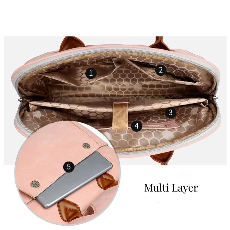 Borsa a tracolla rosa multi-scomparto, design a nido d'ape, tasche interne numerate, chiusura con zip, ideale per laptop e accessori.