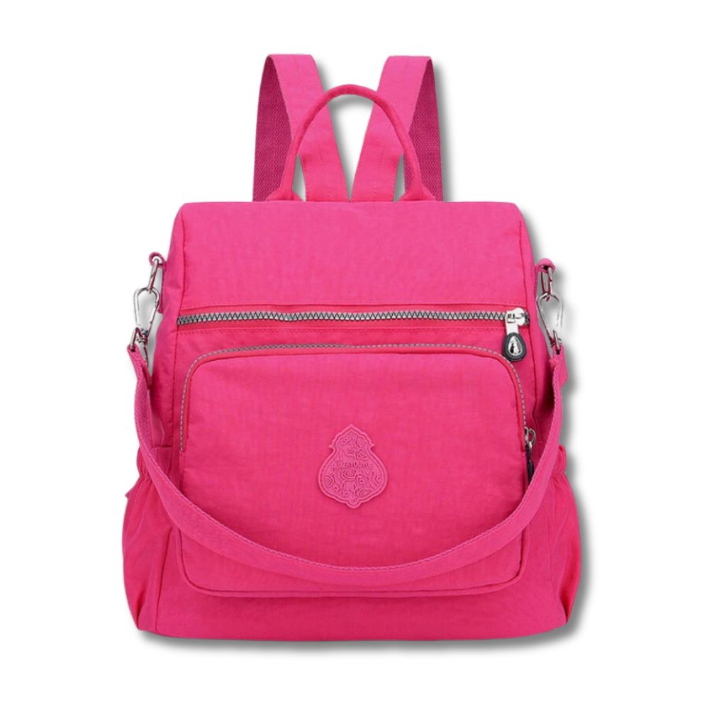 Zaino donna rosa, design moderno, tasche multiple con zip, spallacci regolabili, ideale per scuola e viaggio. Accessorio moda versatile.