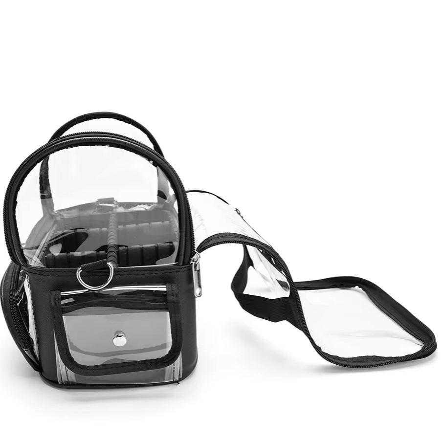 Zaino trasparente in PVC nero con tasche multiple, cerniere robuste e design compatto. Ideale per viaggi, scuola e eventi sportivi.