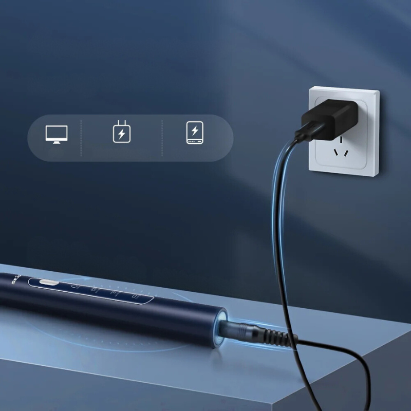 Spazzolino elettrico nero in carica, collegato a una presa a muro. Design moderno, tecnologia avanzata, igiene orale, accessorio bagno essenziale.