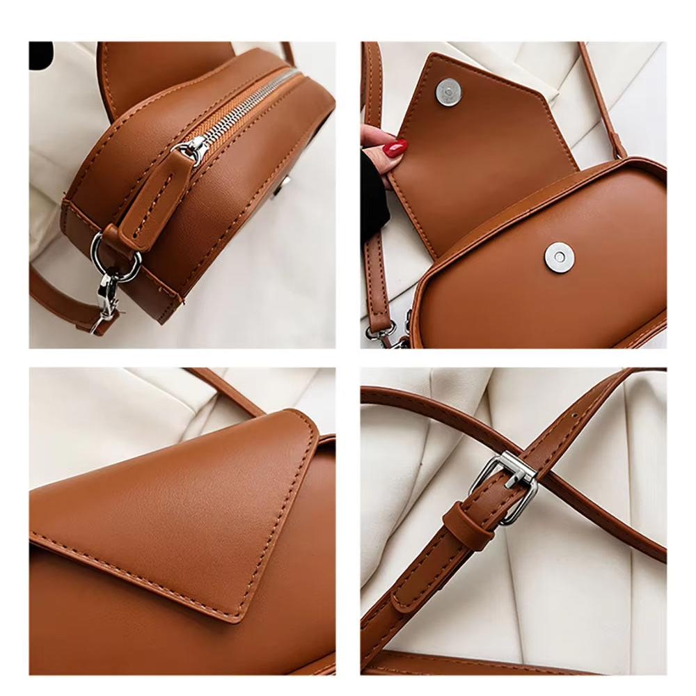 Borsa a tracolla in pelle marrone con chiusura magnetica, cerniera argentata e cinturino regolabile. Design elegante e moderno per donna.